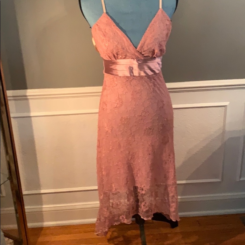 Pink lace shimmery high low dress.